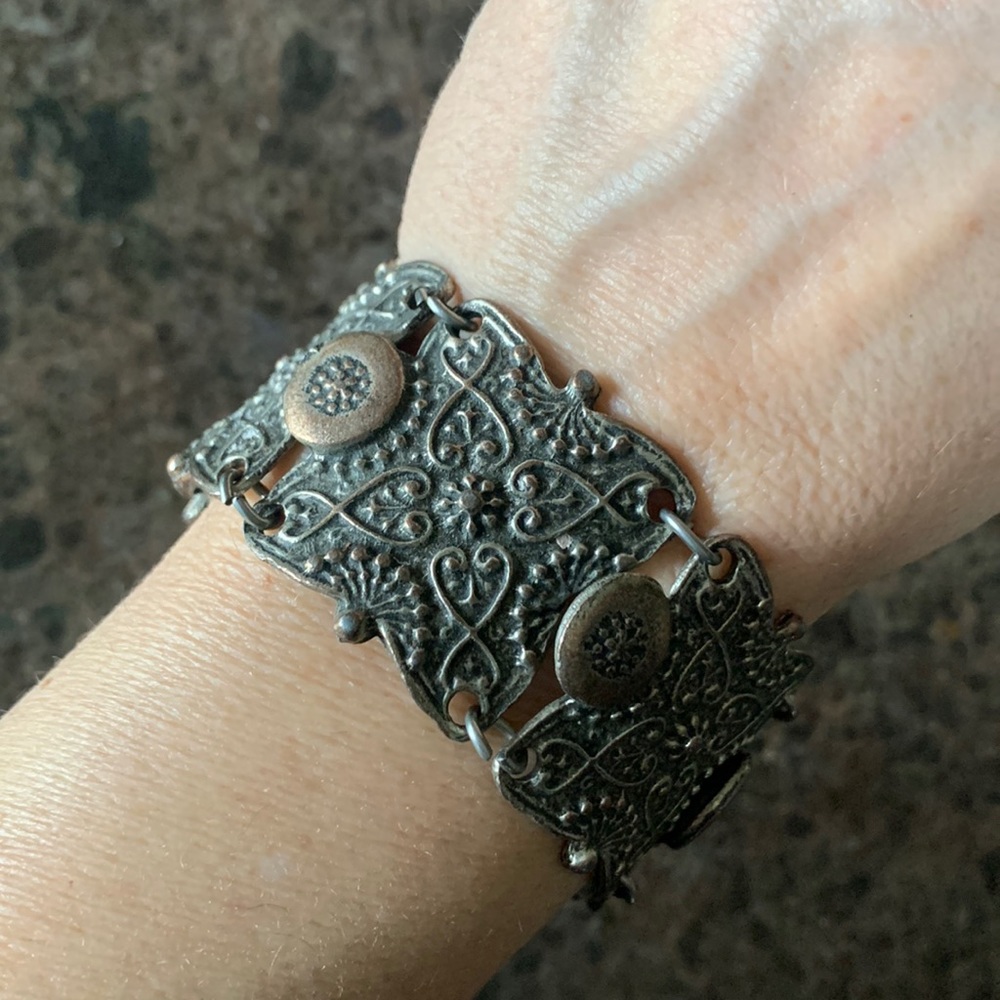 Ornate silver metal unusual bracelet